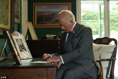Prince Charles signs Guards Orders.jpg
